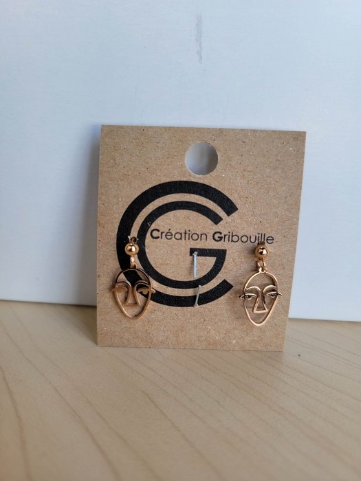 Boucles d'oreilles visage - or rose